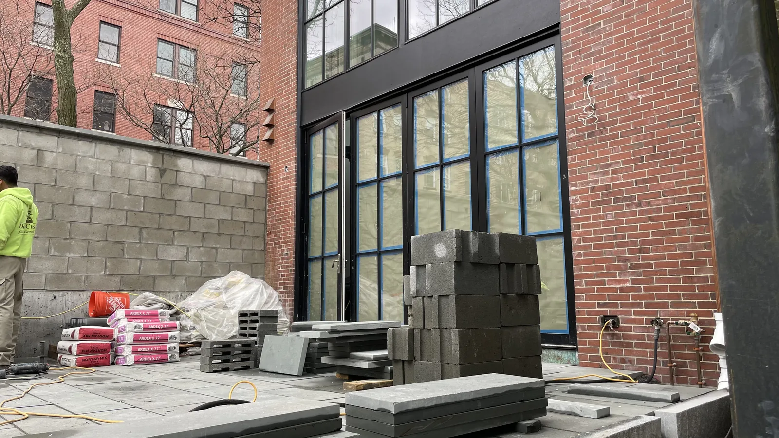 Masonry and steel window installation on a Stein Capital project in Back Bay